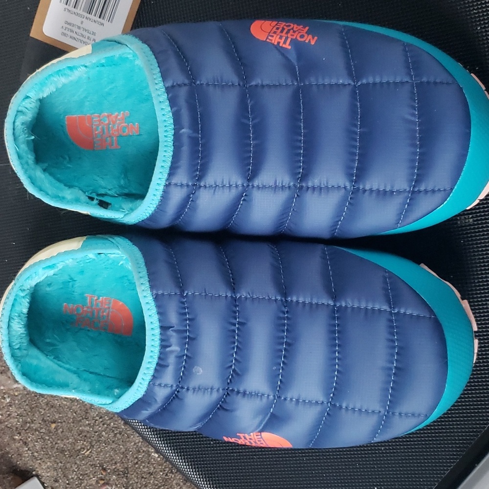 The North Face traction mule, size 8. New with tags.